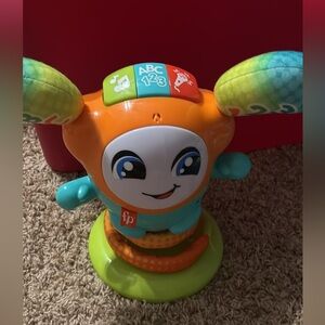 Fisher-Price DJ Bouncin' Beats musical learning toy.
